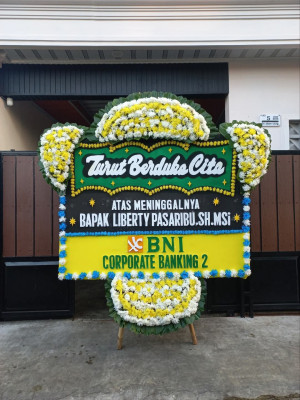 Papan Bunga Duka di Penengahan Raya