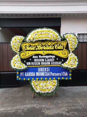 Papan Bunga Duka di Penengahan Raya