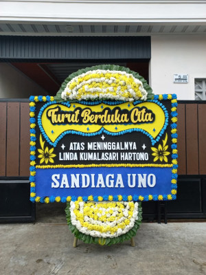 Papan Bunga Duka di Penengahan Raya